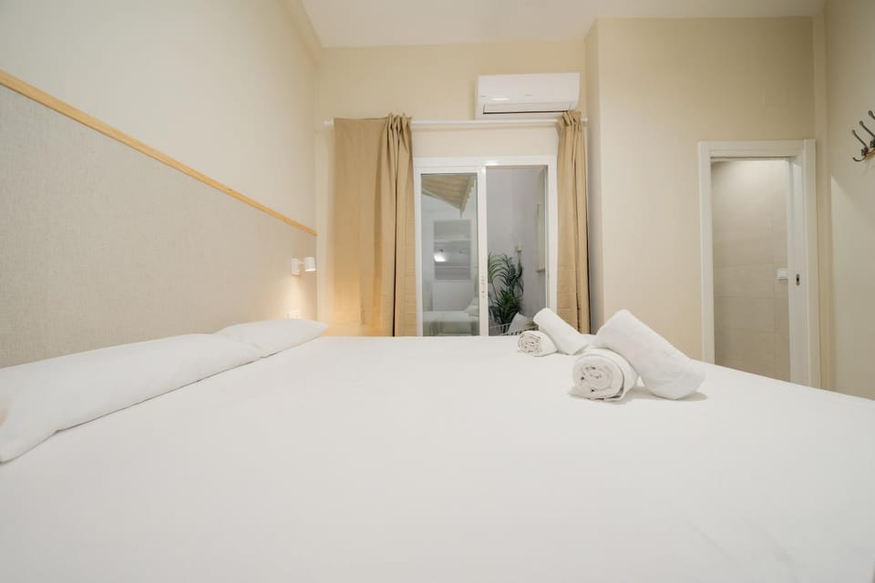 Bed, Photo of the whole room, Bedroom, towels, air conditioner