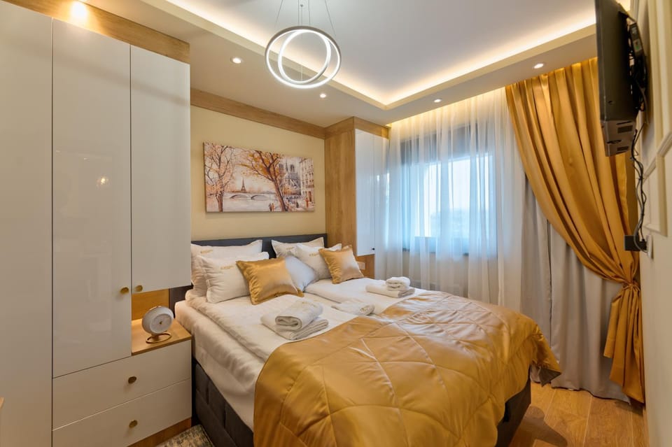 Bed, TV and multimedia, Bedroom, towels, wardrobe