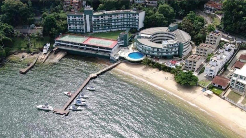 Property building, Nearby landmark, Natural landscape, Bird's eye view, Beach, Pool view, Sea view, Swimming pool