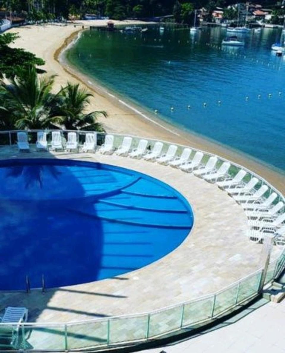 Day, Natural landscape, Beach, Pool view, Sea view, Swimming pool, sunbed