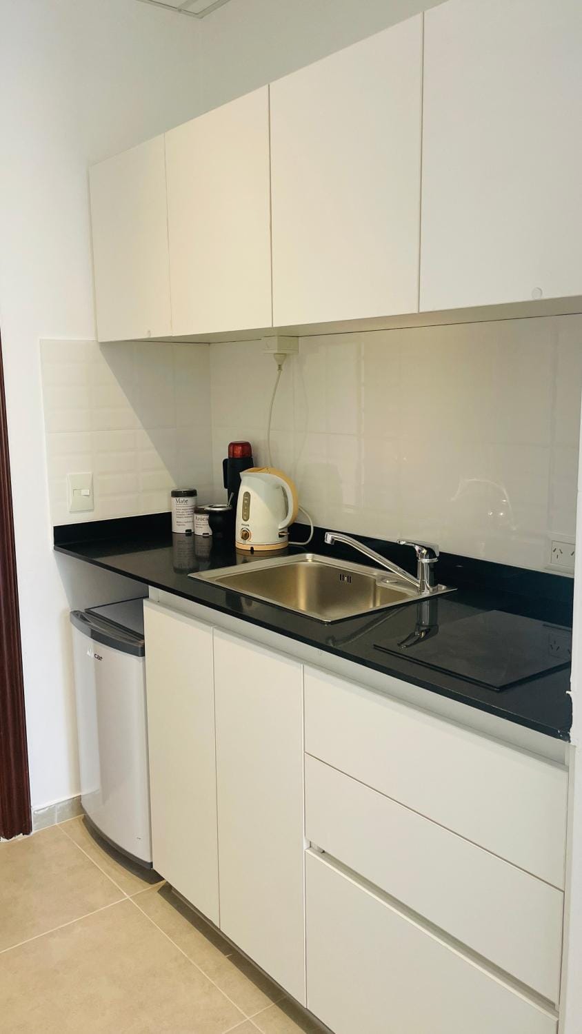 Kitchen or kitchenette, oven, stove