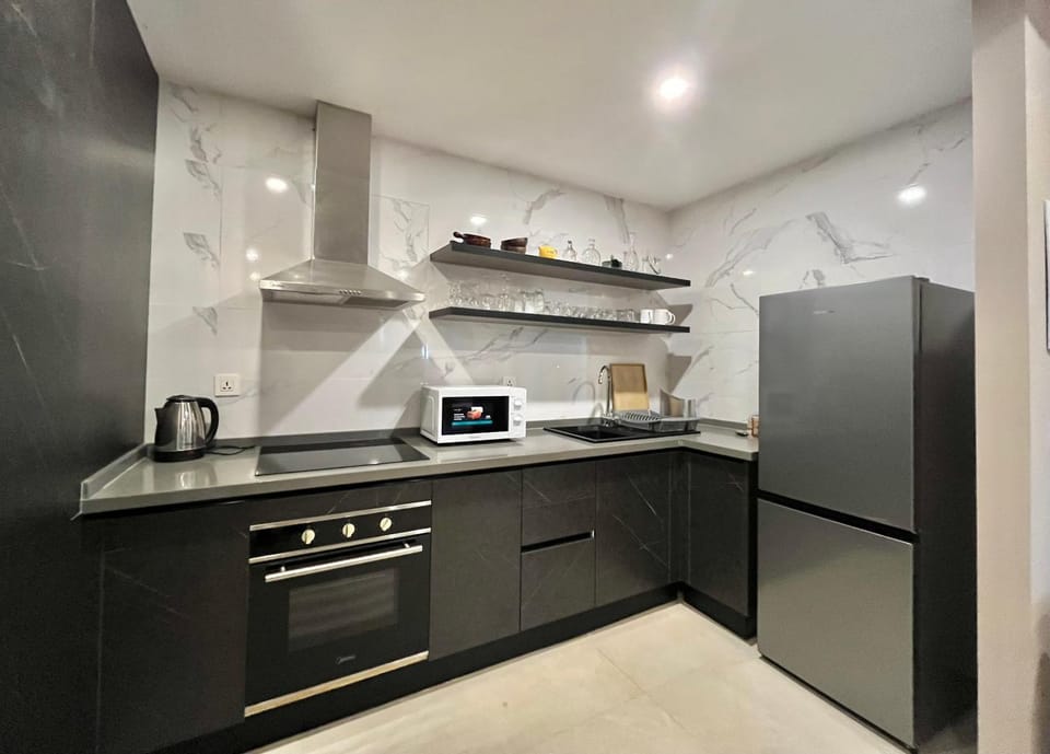 Kitchen or kitchenette, oven