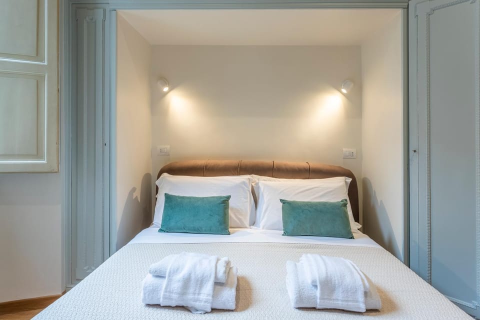 Bed, towels, towels, wardrobe