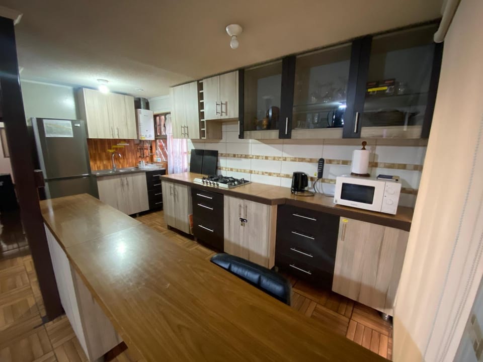 Kitchen or kitchenette, stove, toaster