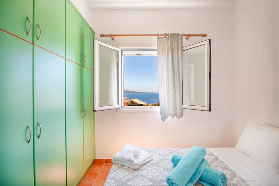Bed, Natural landscape, Bedroom, Sea view, towels, wardrobe
