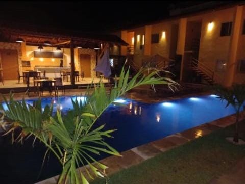 Communal lounge/ TV room, Kitchen or kitchenette, Pool view