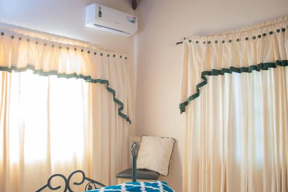 Bed, air conditioner