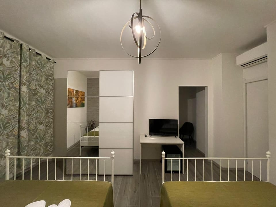Bed, TV and multimedia, Bedroom, hair dresser, wardrobe, air conditioner
