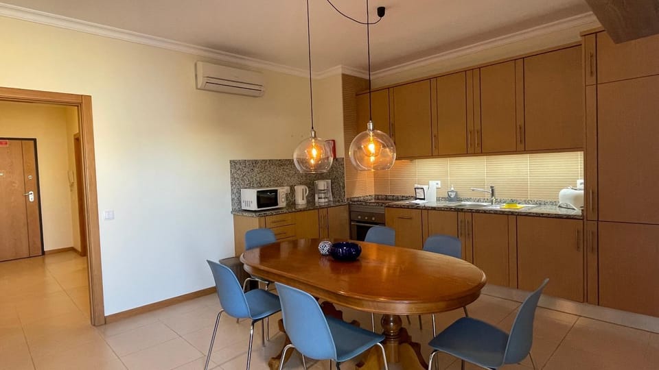 Kitchen or kitchenette, Dining area, stove, air conditioner