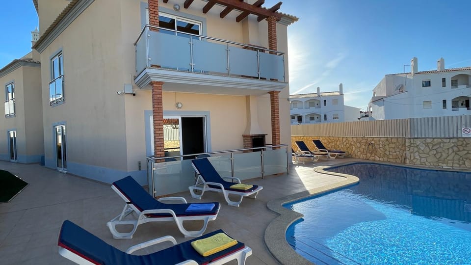 Property building, Day, View (from property/room), Pool view, Swimming pool, sunbed