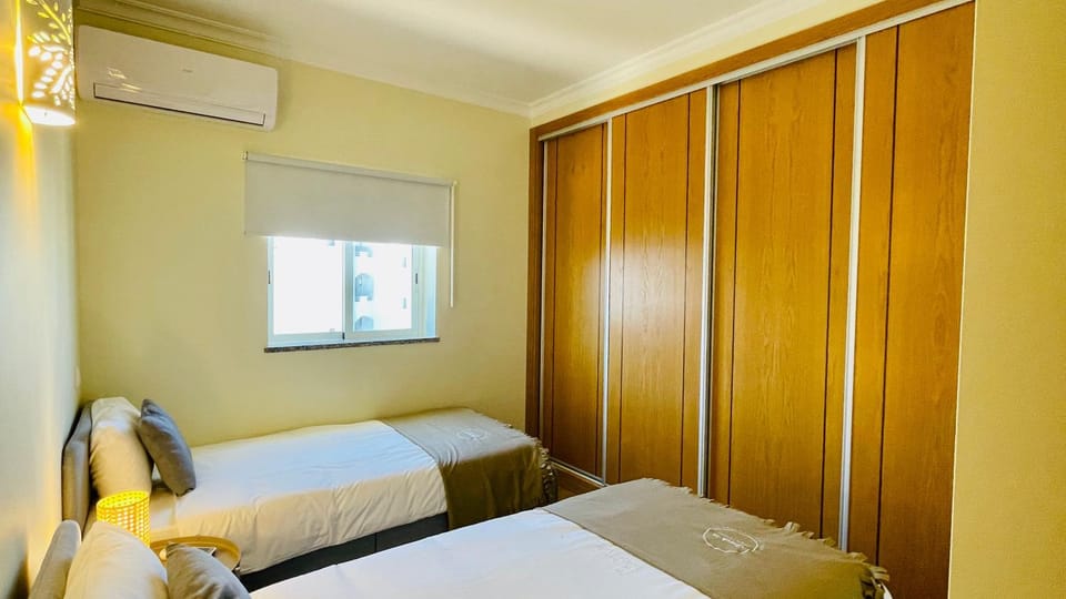 Bed, wardrobe, air conditioner