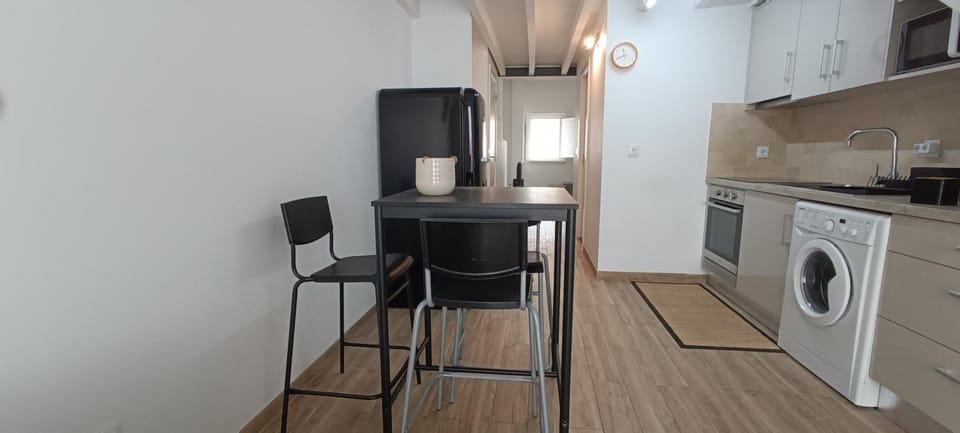 Kitchen or kitchenette, Dining area, oven, stove, toaster, washing machine
