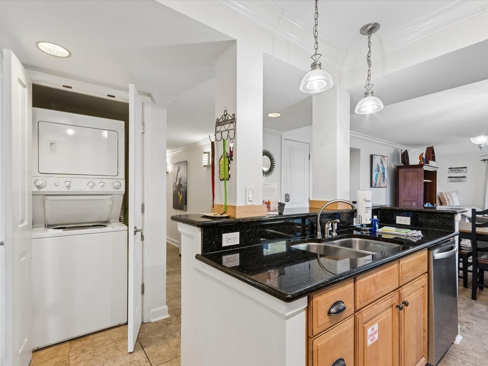 Kitchen or kitchenette, Seating area, Dining area, dishwasher, washing machine, dryer, kitchen
