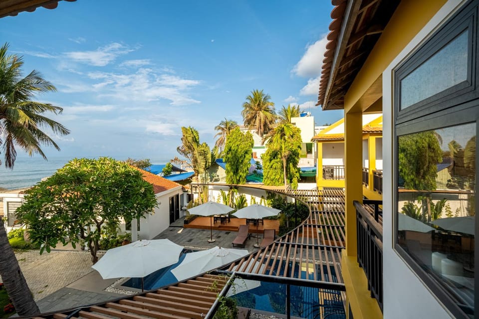 Property building, Patio, Day, Natural landscape, View (from property/room), Balcony/Terrace, Seating area, Pool view, Sea view, Swimming pool, sunbed
