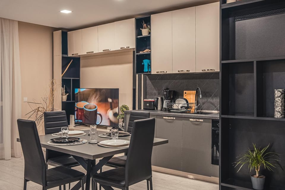 Kitchen or kitchenette, Dining area, furniture, minibar, oven, stove