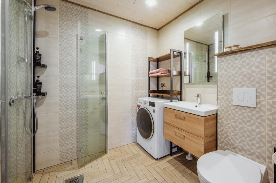 Shower, Toilet, Bathroom, towels, washing machine, dryer