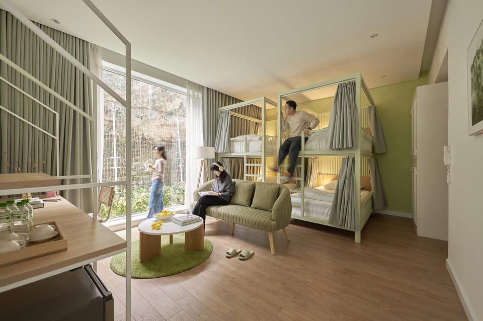 People, View (from property/room), Garden view, group of guests, bunk bed, wardrobe