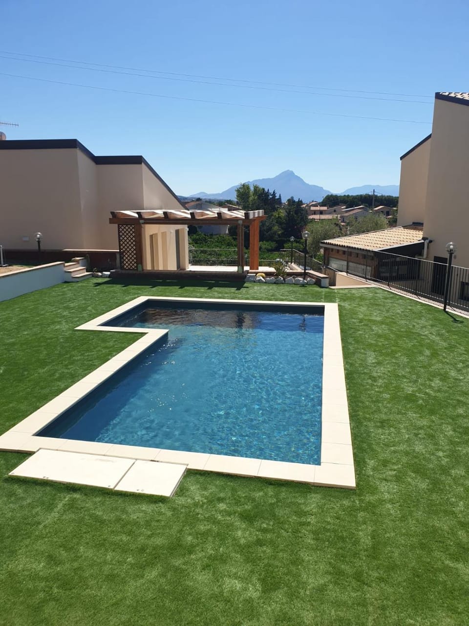 Property building, Day, Natural landscape, Mountain view, Pool view, Swimming pool, Swimming pool, sunbed