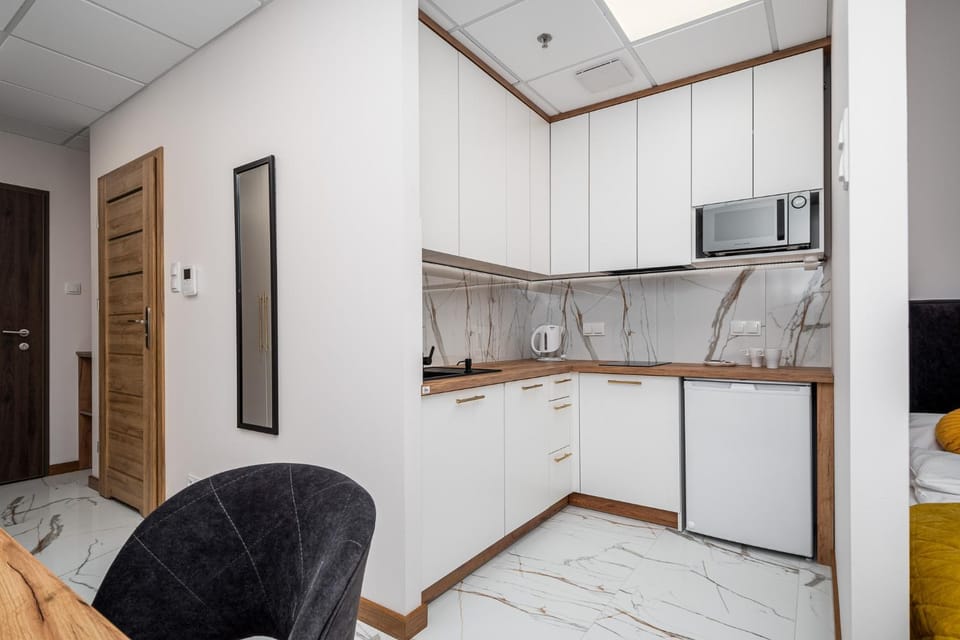 Kitchen or kitchenette, oven, stove