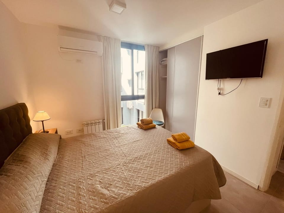 Bed, Photo of the whole room, Bedroom, towels, air conditioner