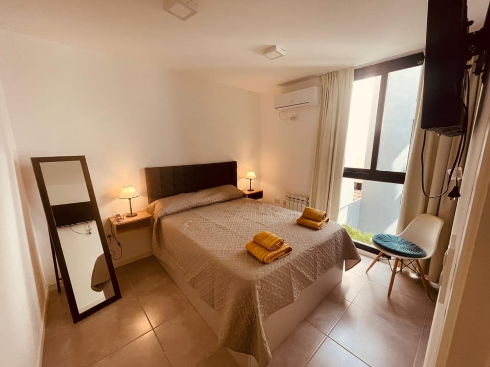Photo of the whole room, Bedroom, towels, wardrobe
