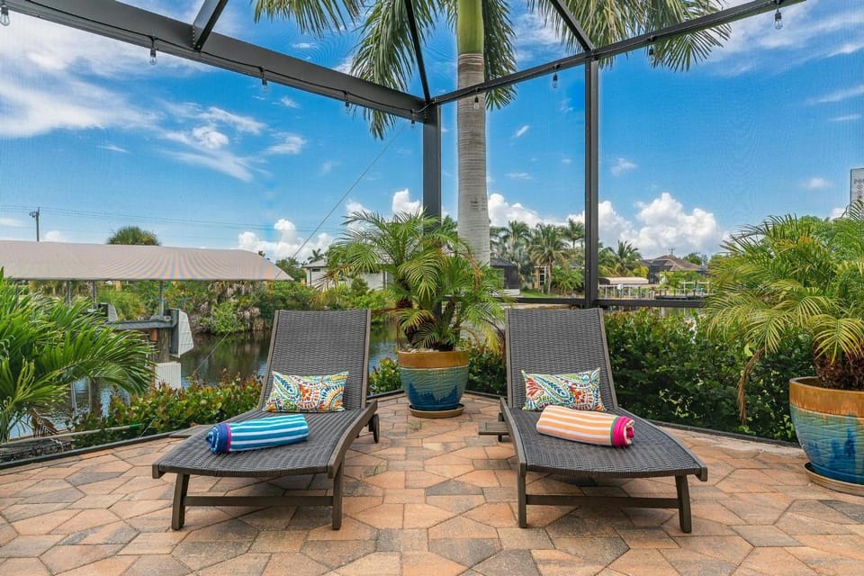 Gulf Access Sleeps 8 - Villa Tropicana - Roelens Vacations House in Cape Coral