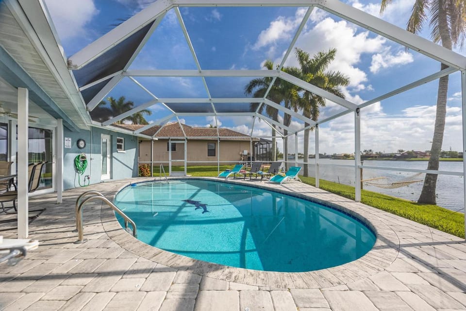 Pet Friendly, Lake view, Game Room - Villa Coral Palace - Roelens Vacations House in Cape Coral