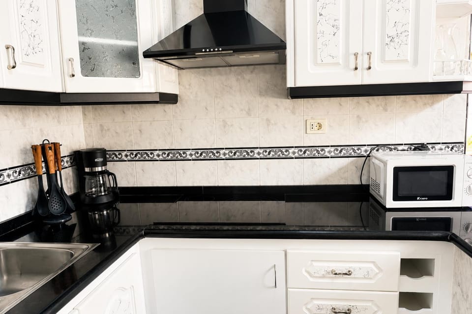 Kitchen or kitchenette, microwave