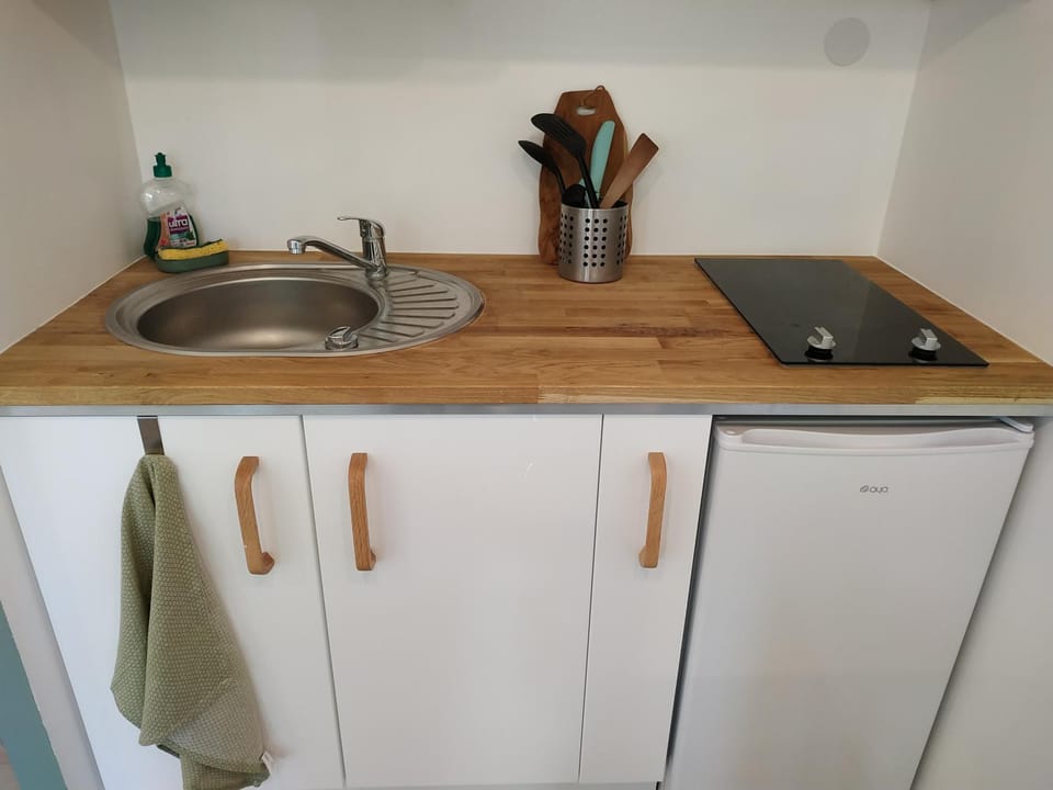 Kitchen or kitchenette, stove