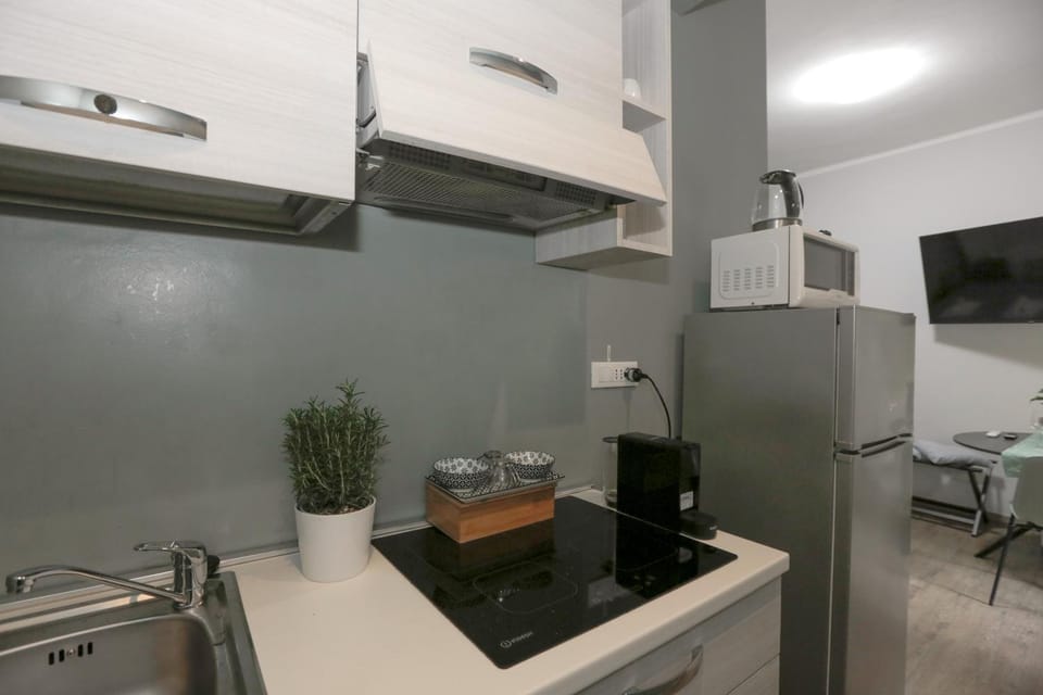 Kitchen or kitchenette, stove