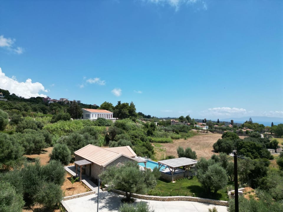 Property building, Natural landscape, Bird's eye view, Garden, Mountain view, Sea view
