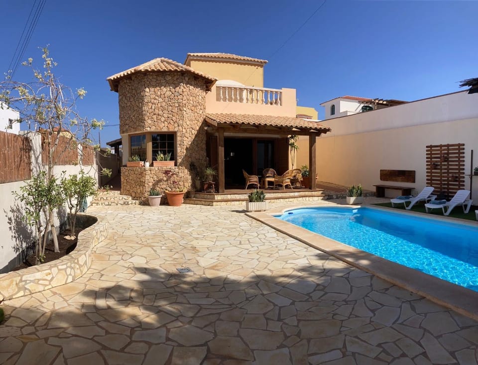 Property building, Patio, Pool view, sunbed