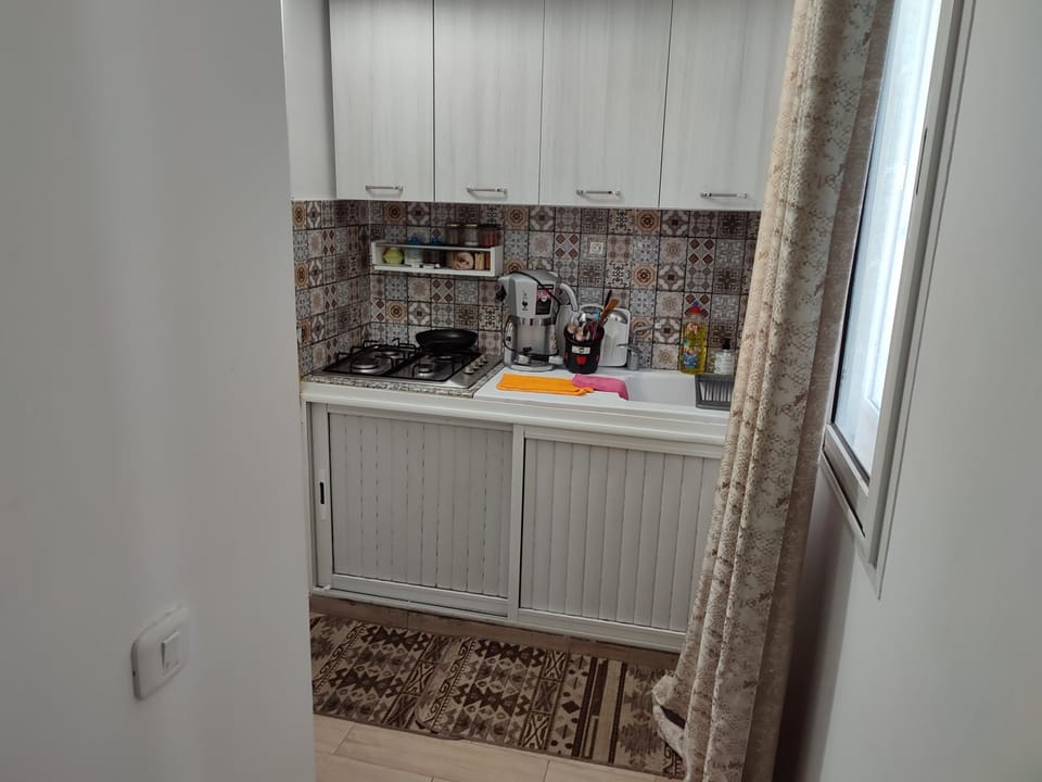 Kitchen or kitchenette, stove