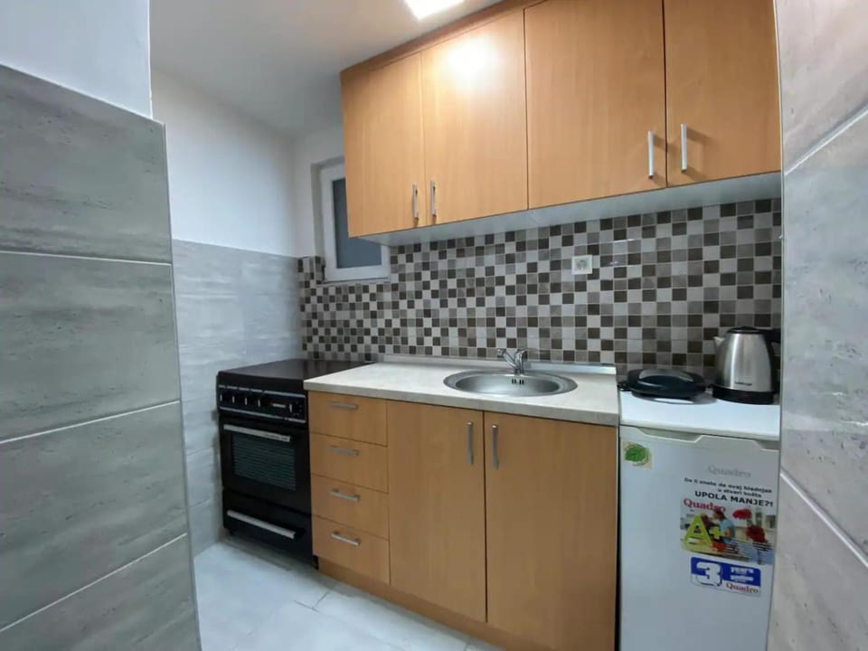 Kitchen or kitchenette, oven, stove, toaster