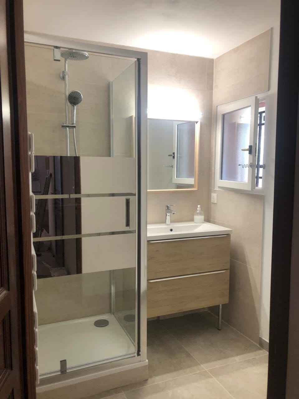 Shower, Bathroom, hair dryier, towels, washing machine