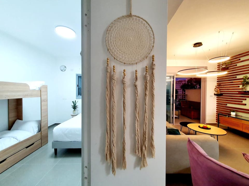 Bed, Living room, Decorative detail, Decorative detail, Seating area, Bedroom, towels