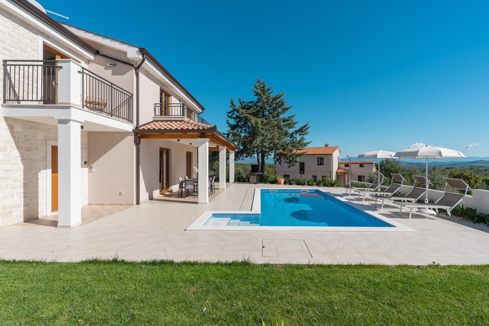 Property building, Patio, Day, Natural landscape, Garden view, Pool view, sunbed