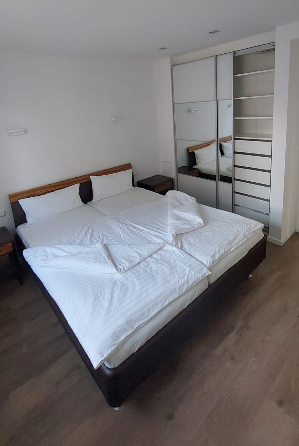 Bed, towels, wardrobe