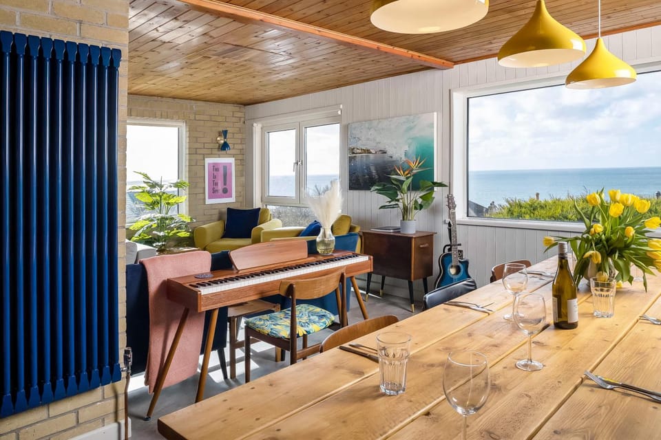 Natural landscape, Living room, Seating area, Dining area, Sea view