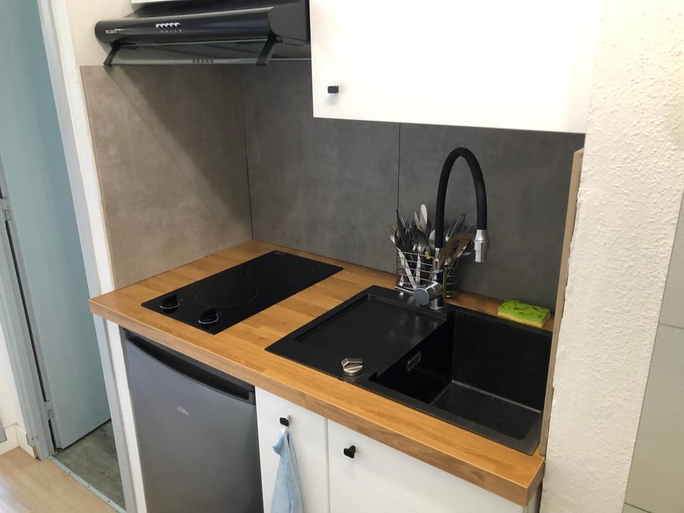 Kitchen or kitchenette, stove
