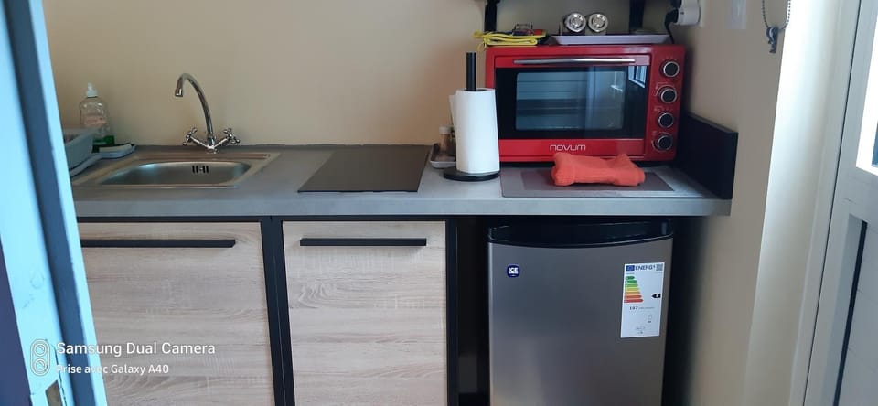 Kitchen or kitchenette, oven, stove