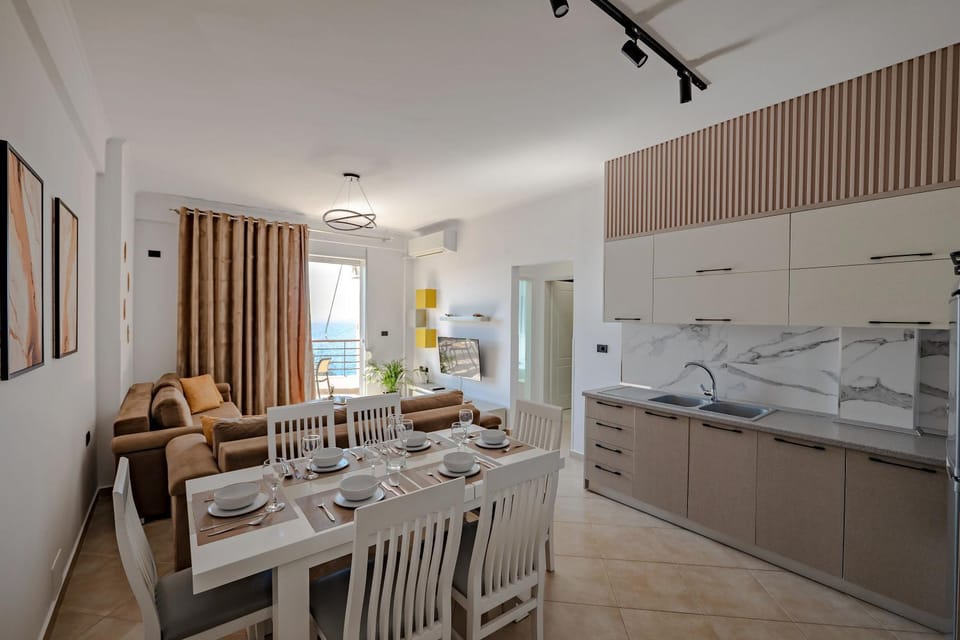 Kitchen or kitchenette, Living room, Seating area, Dining area