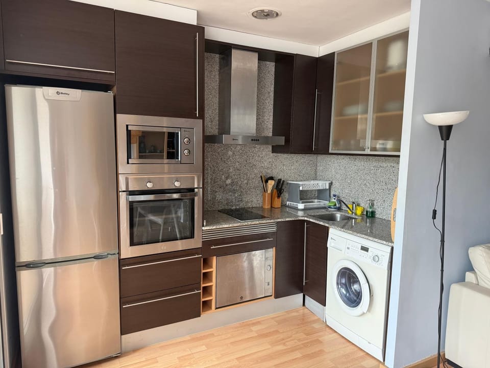 microwave, oven, stove, washing machine, dryer, kitchen