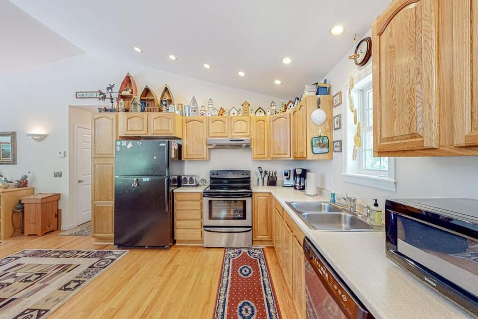 Kitchen or kitchenette, dishwasher, oven, stove, toaster, kitchen