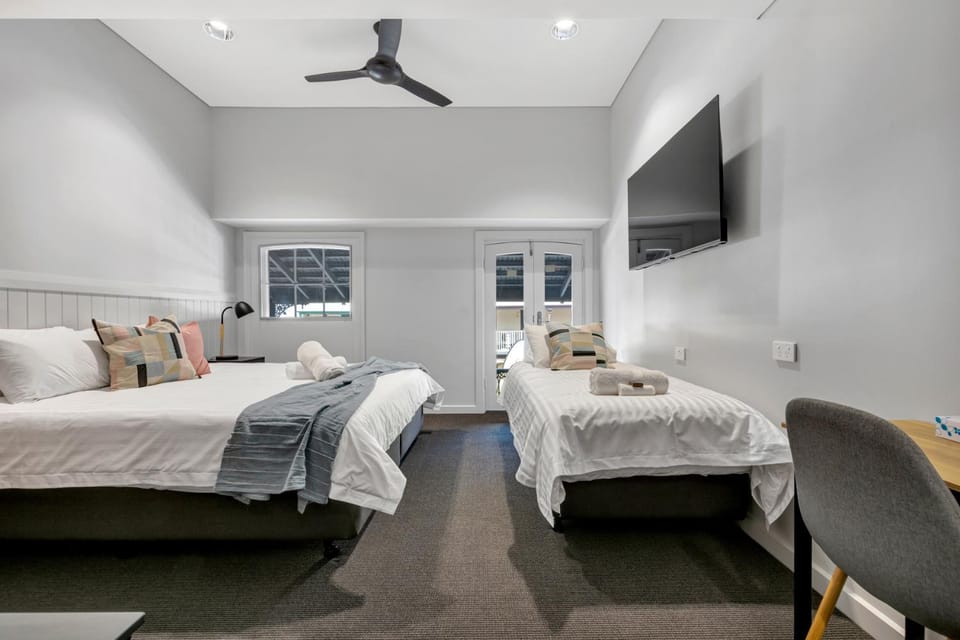Bed, TV and multimedia, fireplace, towels