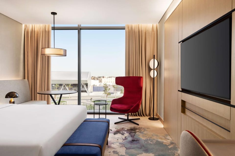 Bed, View (from property/room), Living room, Other, Photo of the whole room, Decorative detail, Seating area, Bedroom, Text overlay, City view, Garden view, Street view, Area and facilities, internet, locker