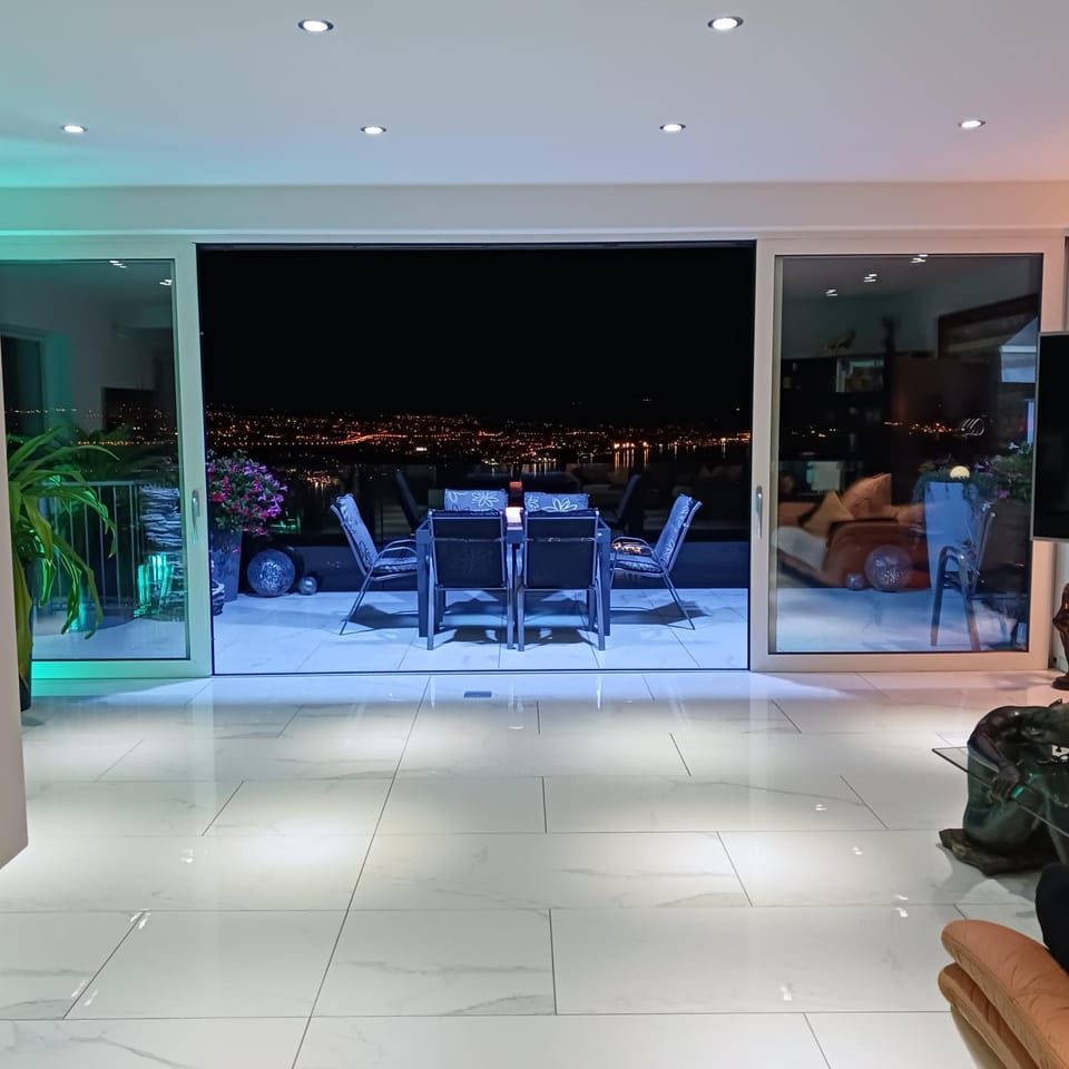 Night, Balcony/Terrace, Living room, Seating area, City view, Sea view