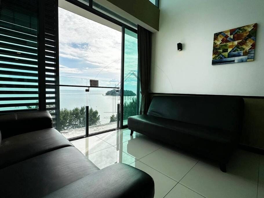 View (from property/room), Living room, Seating area, Sea view