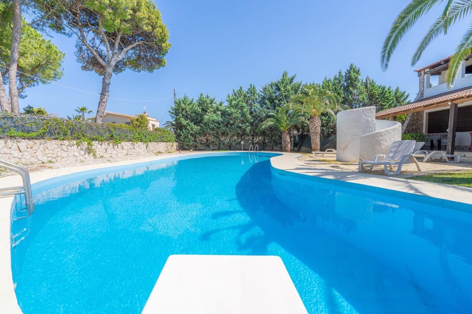 Property building, Living room, Swimming pool