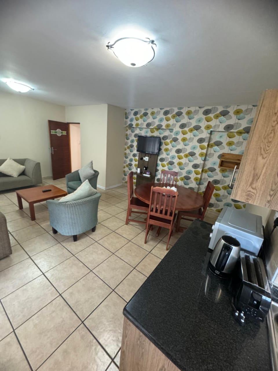 Kitchen or kitchenette, Living room, Seating area